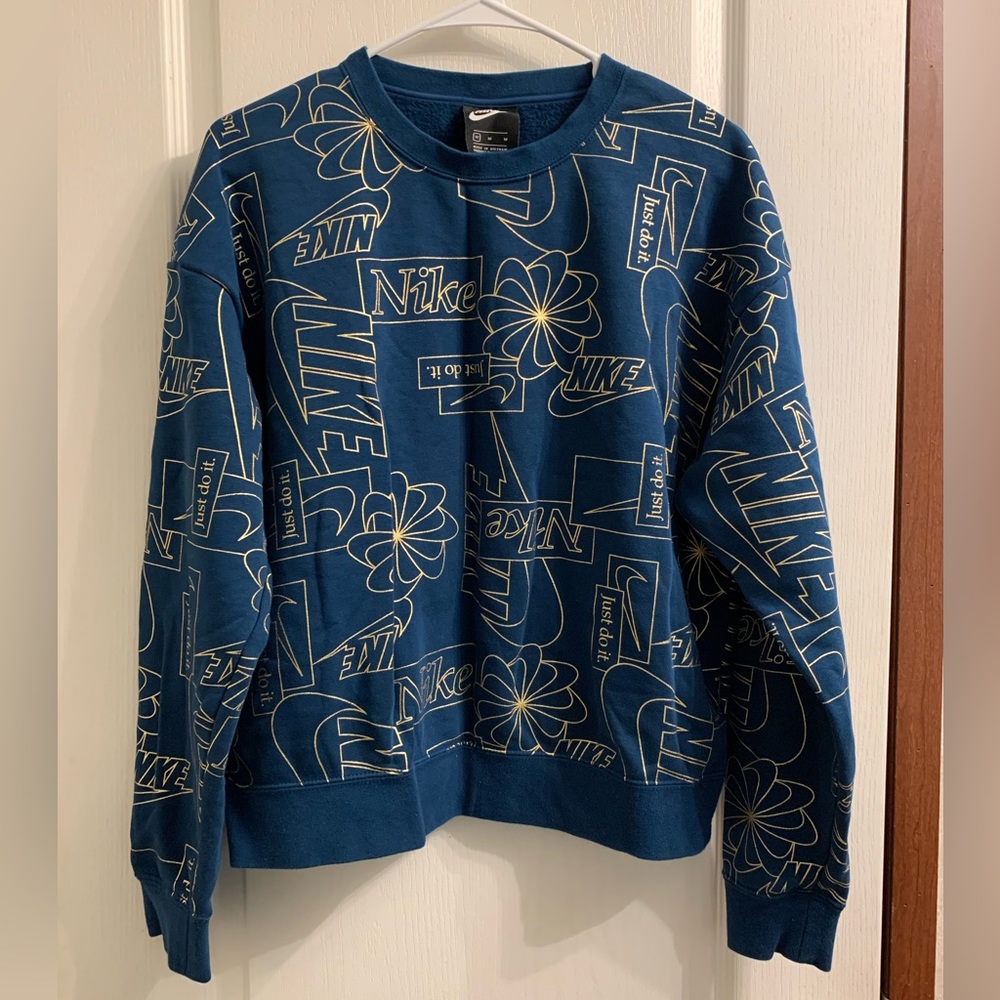 Teal NIKE sweatshirt with gold accents size M